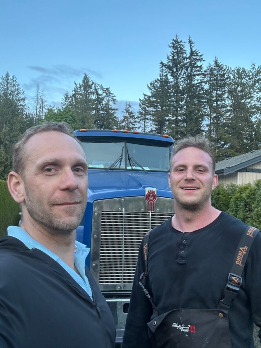 Proseptix team members in front of their septic pump truck